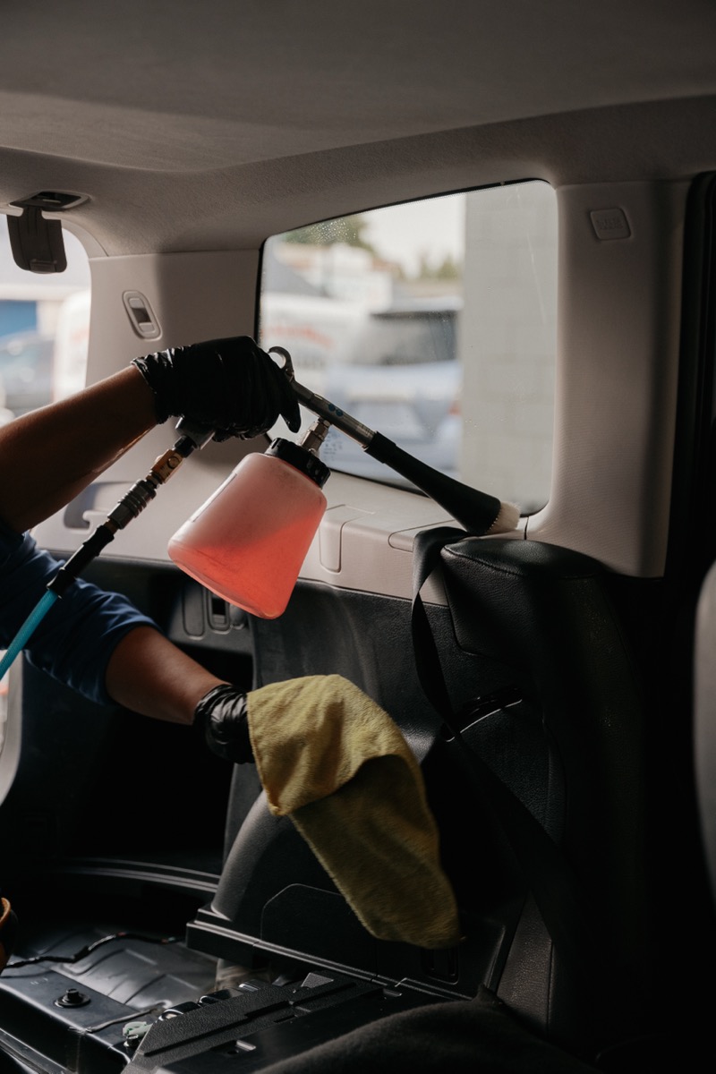 Interior detailing with spray and microfiber cloth