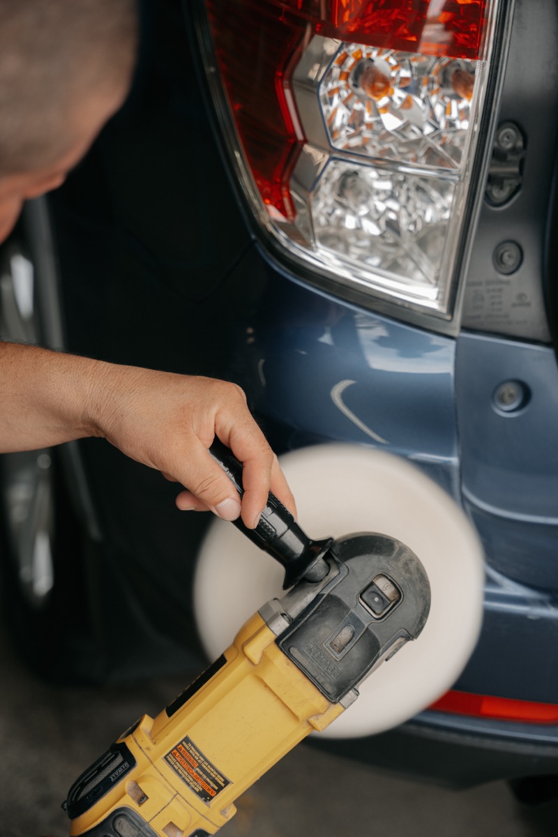 Headlight restoration polishing process at New Delta Auto Glass in Pullman